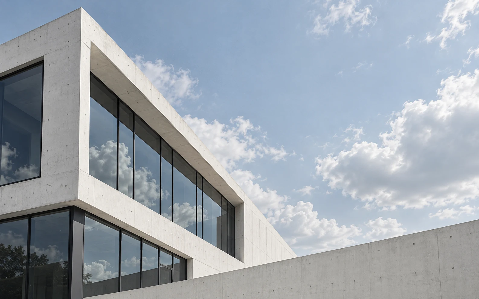Lumen portfolio template preview: a glass and concrete building angled against a bright cloudy sky.